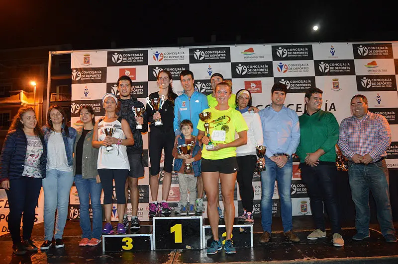 Podium masculino y femenino local