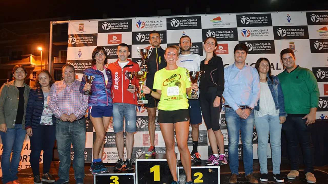 Podium masculino y femenino general
