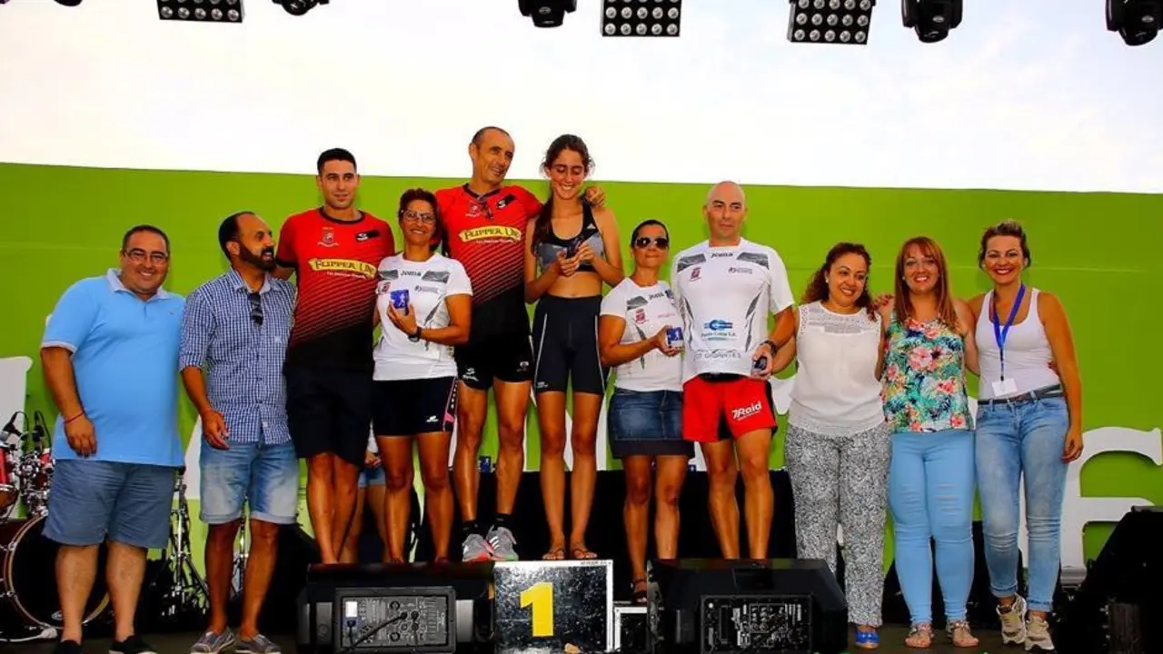 Foto podium masculino y femenino local
