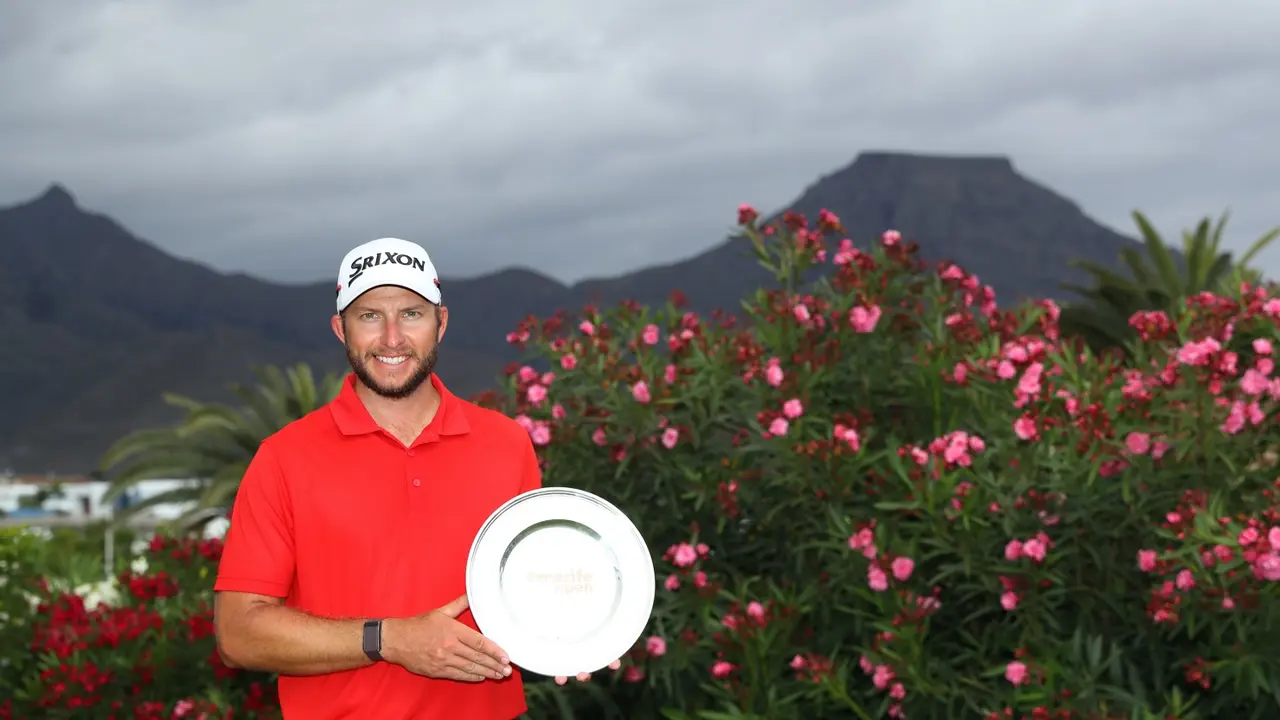 TENERIFE, SPAIN - MAY 02: Dean Burmester of South Africa poses with the trophy after winning the Tenerife Open at Golf Costa Adeje on May 02, 2021 in Tenerife, Spain. (Photo by Warren Little/Getty Images)