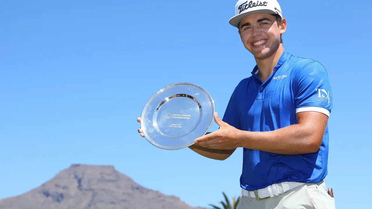 TENERIFE, SPAIN - MAY 09:  Garrick Higgo of South Africa poses with the trophy after winning the Canary Islands Championship at Golf Costa Adeje on May 09, 2021 in Tenerife, Spain. (Photo by Andrew Redington/Getty Images)